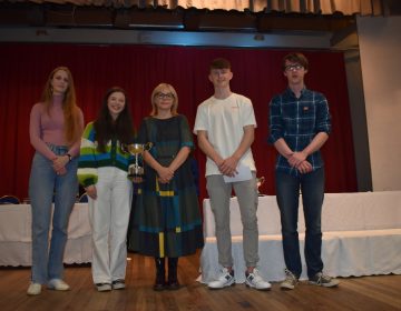 Our Top Achievers at A Level with the Liam Agnew Cup Leja Voroblevaite Ellen Martin Seanie Mc Intosh and Aidan Higgins with guest speaker Dr Thelma Craig